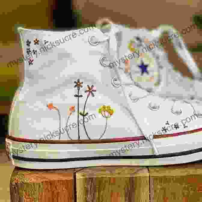 A Pair Of White Sneakers With A Small Embroidered Floral Design On The Toes Customize Your Clothes: 20 Hand Embroidery Projects To Update Your Wardrobe