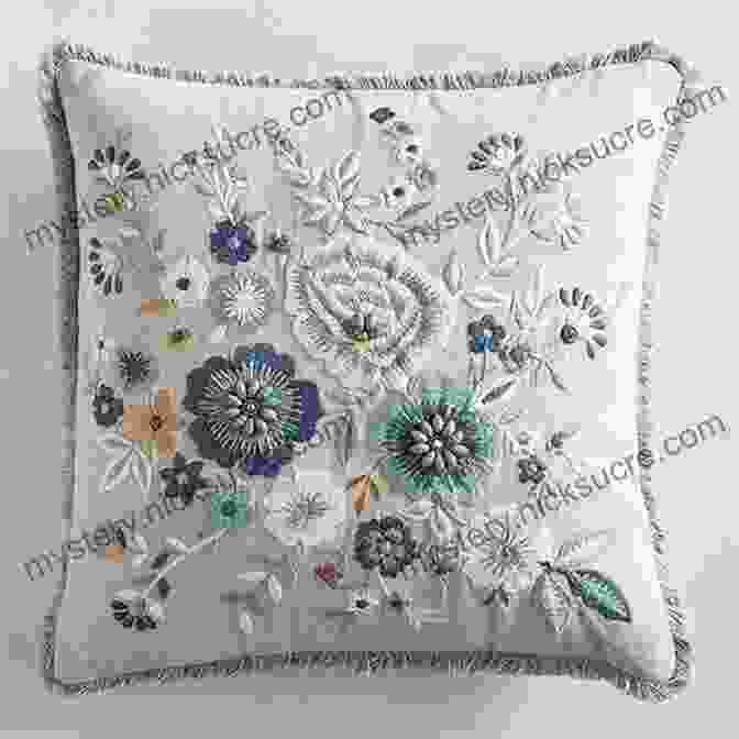 A White Pillowcase With A Blue Embroidered Floral Design Customize Your Clothes: 20 Hand Embroidery Projects To Update Your Wardrobe