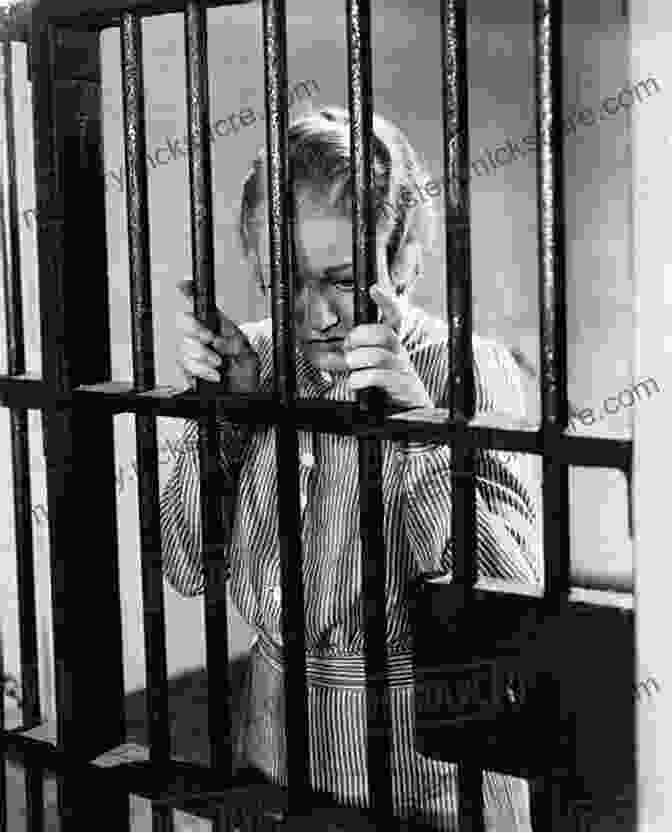 A Young Woman In A Prison Uniform Standing In A Cell, Looking Determined Prison Life Is Easy For A Villainess: Volume 1