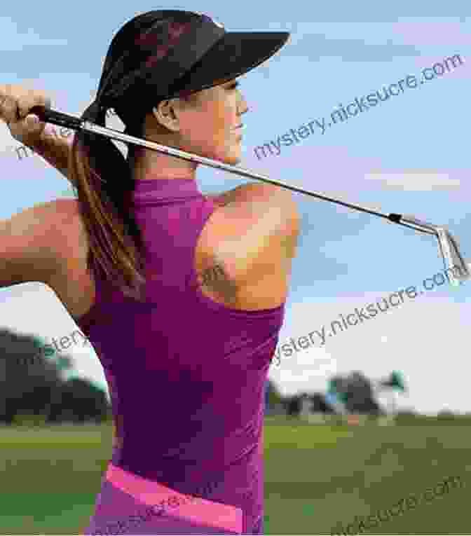 Female Golfer Performing A Swing Under Pressure Grounded Golf: Steady Performance Under Pressure For The Female Golfer