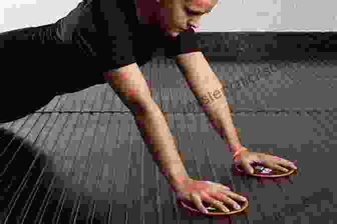 Person Demonstrating Spider Man Sliders On Core Sliders, Enhancing Core Strength, Flexibility, And Coordination Exercises With Core Sliders: 40+ Exercises To Strengthen Your Core Sculpt Your Mid Section Using Gliding Discs (Fitness Sutra)