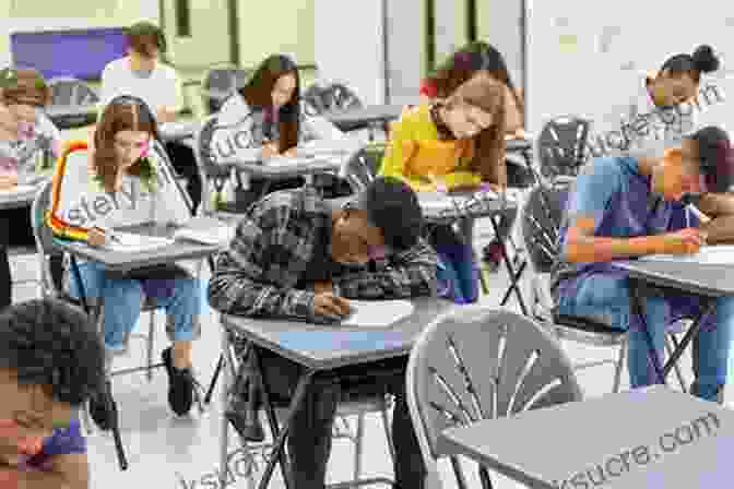 Student Studying At A Desk In A Classroom The High School Survival Guide: Your Roadmap To Studying Socializing Succeeding (Ages 12 16) (8th Grade Graduation Gift)